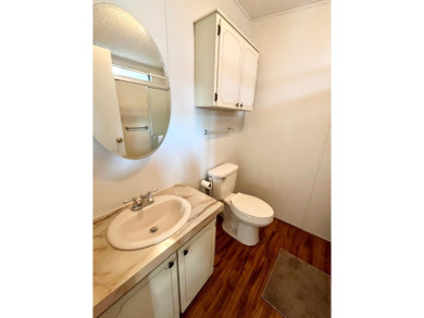 This 2-bedroom, 2-bathroom home is ready for new owners! on Lake Fairways Country Club in Florida - for sale on GolfHomes.com, golf home, golf lot