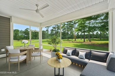 Discover the Skiff, a beautiful new Logan Home, located in on Sea Trail Golf Resort in North Carolina - for sale on GolfHomes.com, golf home, golf lot