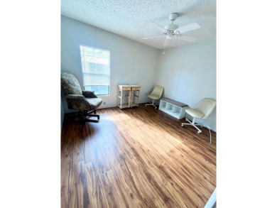This 2-bedroom, 2-bathroom home is ready for new owners! on Lake Fairways Country Club in Florida - for sale on GolfHomes.com, golf home, golf lot