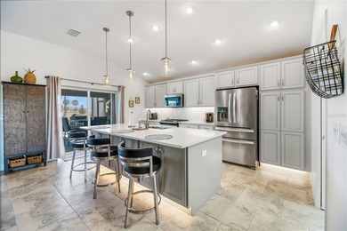 Rare find - Stretched Indigo Designer model with pool and water on Pennbrooke Fairways in Florida - for sale on GolfHomes.com, golf home, golf lot