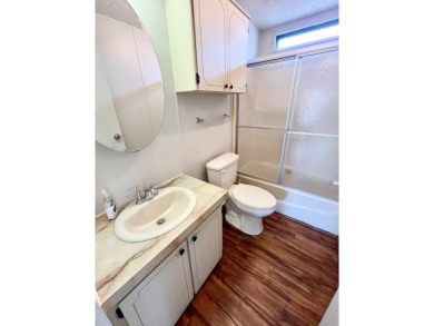 This 2-bedroom, 2-bathroom home is ready for new owners! on Lake Fairways Country Club in Florida - for sale on GolfHomes.com, golf home, golf lot