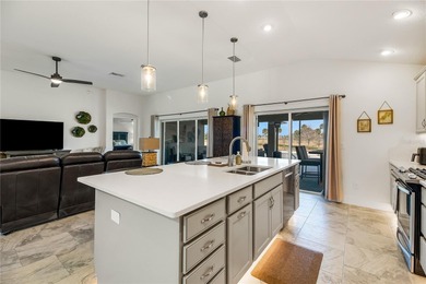 Rare find - Stretched Indigo Designer model with pool and water on Pennbrooke Fairways in Florida - for sale on GolfHomes.com, golf home, golf lot