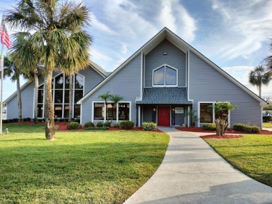 This 2/1.5 manufactured home is priced to sell. It is nestled up on Lake Henry Golf Club in Florida - for sale on GolfHomes.com, golf home, golf lot