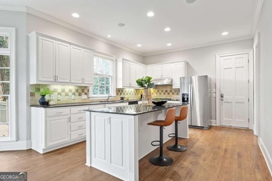 Welcome home to 2182 McKinley Road NW, where refined Buckhead on Bobby Jones Golf Club in Georgia - for sale on GolfHomes.com, golf home, golf lot