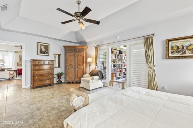 Nestled within the exclusive gates of the Plantation Bay on Plantation Bay Golf and Country Club in Florida - for sale on GolfHomes.com, golf home, golf lot