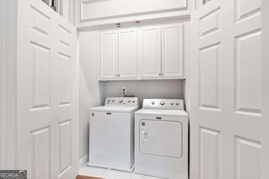 Welcome home to 2182 McKinley Road NW, where refined Buckhead on Bobby Jones Golf Club in Georgia - for sale on GolfHomes.com, golf home, golf lot