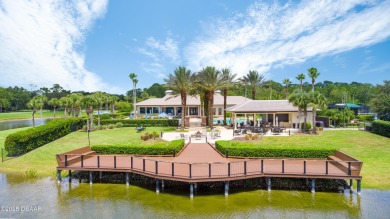 Nestled within the exclusive gates of the Plantation Bay on Plantation Bay Golf and Country Club in Florida - for sale on GolfHomes.com, golf home, golf lot