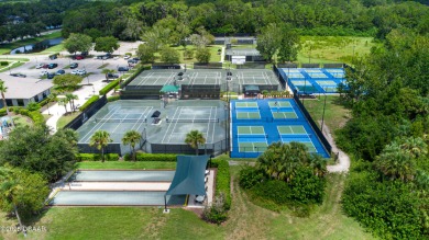 Nestled within the exclusive gates of the Plantation Bay on Plantation Bay Golf and Country Club in Florida - for sale on GolfHomes.com, golf home, golf lot