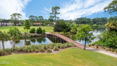 Nestled within the exclusive gates of the Plantation Bay on Plantation Bay Golf and Country Club in Florida - for sale on GolfHomes.com, golf home, golf lot