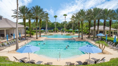 Nestled within the exclusive gates of the Plantation Bay on Plantation Bay Golf and Country Club in Florida - for sale on GolfHomes.com, golf home, golf lot