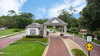 Nestled within the exclusive gates of the Plantation Bay on Plantation Bay Golf and Country Club in Florida - for sale on GolfHomes.com, golf home, golf lot