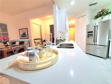 Easy Naples FL Living Awaits! Discover this beautiful 1st floor on Glen Eagle Golf and Country Club in Florida - for sale on GolfHomes.com, golf home, golf lot