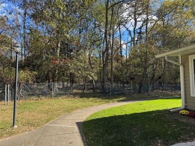 This completely renovated extraordinary Greenbriar model end on Leisure Village Golf Course in New York - for sale on GolfHomes.com, golf home, golf lot