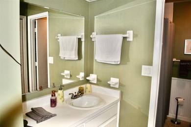 WELCOME to this spacious, TURN KEY Villa located in the HIGHLY on East Lake Woodlands Country Club in Florida - for sale on GolfHomes.com, golf home, golf lot