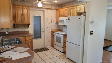 You will absolutely love this home in Mainlands! This updated on Mainlands Golf Club in Florida - for sale on GolfHomes.com, golf home, golf lot