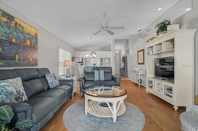 Welcome to this beautiful second-floor end-unit condominium on Peridia Golf and Country Club in Florida - for sale on GolfHomes.com, golf home, golf lot