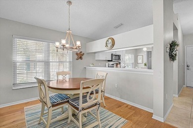 Welcome to this beautiful second-floor end-unit condominium on Peridia Golf and Country Club in Florida - for sale on GolfHomes.com, golf home, golf lot