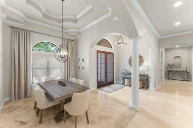 Updated, custom-built home nestled within the highly desirable on Regatta Bay Golf and Country Club in Florida - for sale on GolfHomes.com, golf home, golf lot