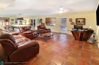 This charming 3-bedroom, 2-bathroom home offers a spacious on Pompano Beach Golf Course  in Florida - for sale on GolfHomes.com, golf home, golf lot