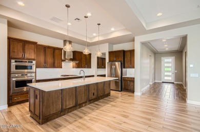 Located in the highly desirable Pebble Creek community, this on Tuscany Falls At Pebble Creek in Arizona - for sale on GolfHomes.com, golf home, golf lot