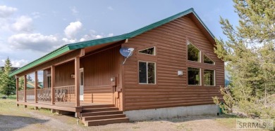 This Charming Cabin is Ready for You-  Fully Furnished and on Island Park Village Resort Golf Course in Idaho - for sale on GolfHomes.com, golf home, golf lot