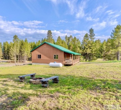This Charming Cabin is Ready for You-  Fully Furnished and on Island Park Village Resort Golf Course in Idaho - for sale on GolfHomes.com, golf home, golf lot