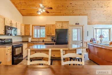 This Charming Cabin is Ready for You-  Fully Furnished and on Island Park Village Resort Golf Course in Idaho - for sale on GolfHomes.com, golf home, golf lot