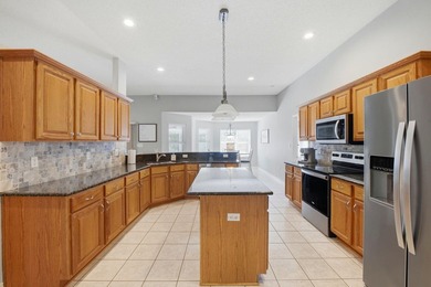 Welcome to the beautiful brick home on Brinkley Street in Hidden on The Club At Hidden Creek in Florida - for sale on GolfHomes.com, golf home, golf lot