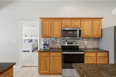 Welcome to the beautiful brick home on Brinkley Street in Hidden on The Club At Hidden Creek in Florida - for sale on GolfHomes.com, golf home, golf lot