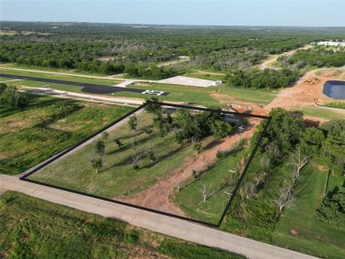 Don't miss your opportunity to live with your airplane on the on Pecan Plantation Country Club in Texas - for sale on GolfHomes.com, golf home, golf lot
