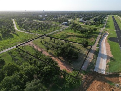 Don't miss your opportunity to live with your airplane on the on Pecan Plantation Country Club in Texas - for sale on GolfHomes.com, golf home, golf lot