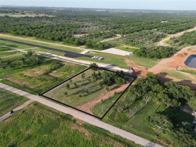 Don't miss your opportunity to live with your airplane on the on Pecan Plantation Country Club in Texas - for sale on GolfHomes.com, golf home, golf lot