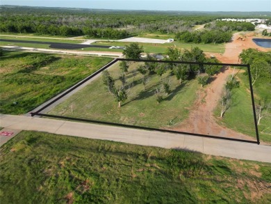 Don't miss your opportunity to live with your airplane on the on Pecan Plantation Country Club in Texas - for sale on GolfHomes.com, golf home, golf lot