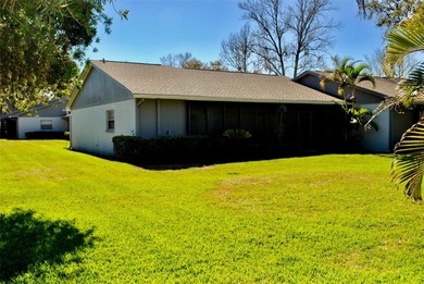 WELCOME to this spacious, TURN KEY Villa located in the HIGHLY on East Lake Woodlands Country Club in Florida - for sale on GolfHomes.com, golf home, golf lot