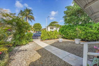 Charming beach bungalow in amazing location! You'll love this on Lake Worth Municipal Golf Course in Florida - for sale on GolfHomes.com, golf home, golf lot
