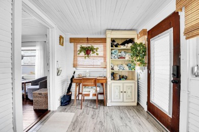 Charming beach bungalow in amazing location! You'll love this on Lake Worth Municipal Golf Course in Florida - for sale on GolfHomes.com, golf home, golf lot