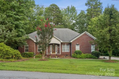 Nestled in the tranquil golf course landscape of Pine Island on Pine Island Country Club in North Carolina - for sale on GolfHomes.com, golf home, golf lot
