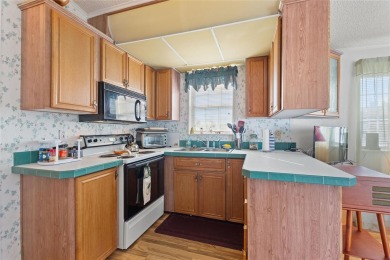 This charming 1 bedroom, 1 bath home offers a delightful blend on Southern Dunes Golf and Country Club in Florida - for sale on GolfHomes.com, golf home, golf lot