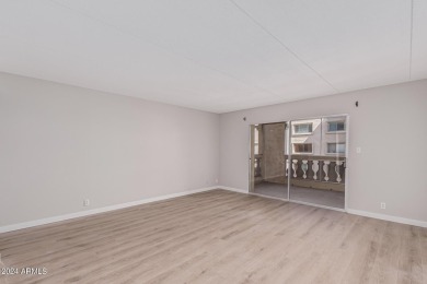 Experience luxury living in this fully remodeled 1-bedroom on Scottsdale Shadows in Arizona - for sale on GolfHomes.com, golf home, golf lot