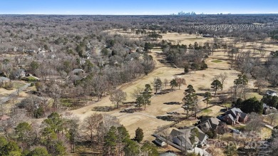 Nestled in the tranquil golf course landscape of Pine Island on Pine Island Country Club in North Carolina - for sale on GolfHomes.com, golf home, golf lot