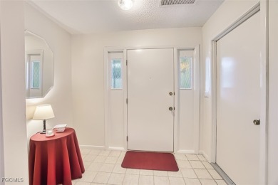 This METICULOUSLY-MAINTAINED *condo-villa* with a BRAND NEW ROOF on Myerlee Country Club in Florida - for sale on GolfHomes.com, golf home, golf lot