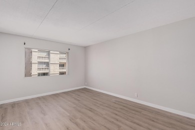 Experience luxury living in this fully remodeled 1-bedroom on Scottsdale Shadows in Arizona - for sale on GolfHomes.com, golf home, golf lot