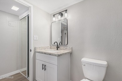 Experience luxury living in this fully remodeled 1-bedroom on Scottsdale Shadows in Arizona - for sale on GolfHomes.com, golf home, golf lot