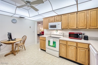This METICULOUSLY-MAINTAINED *condo-villa* with a BRAND NEW ROOF on Myerlee Country Club in Florida - for sale on GolfHomes.com, golf home, golf lot