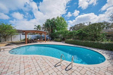 Welcome to an exceptional three-bedroom, two bath, one story on The Dunedin Country Club in Florida - for sale on GolfHomes.com, golf home, golf lot