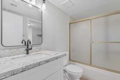 Experience luxury living in this fully remodeled 1-bedroom on Scottsdale Shadows in Arizona - for sale on GolfHomes.com, golf home, golf lot