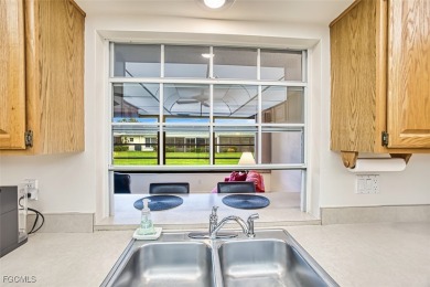 This METICULOUSLY-MAINTAINED *condo-villa* with a BRAND NEW ROOF on Myerlee Country Club in Florida - for sale on GolfHomes.com, golf home, golf lot