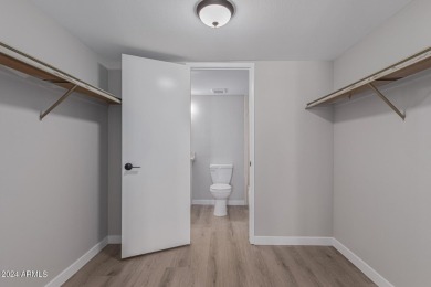 Experience luxury living in this fully remodeled 1-bedroom on Scottsdale Shadows in Arizona - for sale on GolfHomes.com, golf home, golf lot
