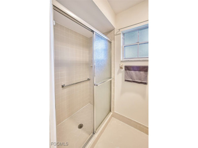 This METICULOUSLY-MAINTAINED *condo-villa* with a BRAND NEW ROOF on Myerlee Country Club in Florida - for sale on GolfHomes.com, golf home, golf lot