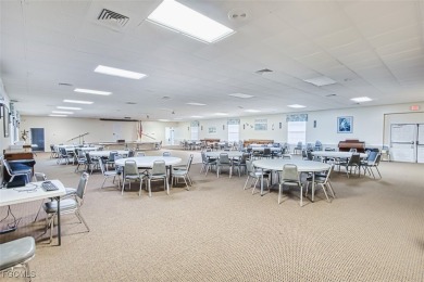 This METICULOUSLY-MAINTAINED *condo-villa* with a BRAND NEW ROOF on Myerlee Country Club in Florida - for sale on GolfHomes.com, golf home, golf lot
